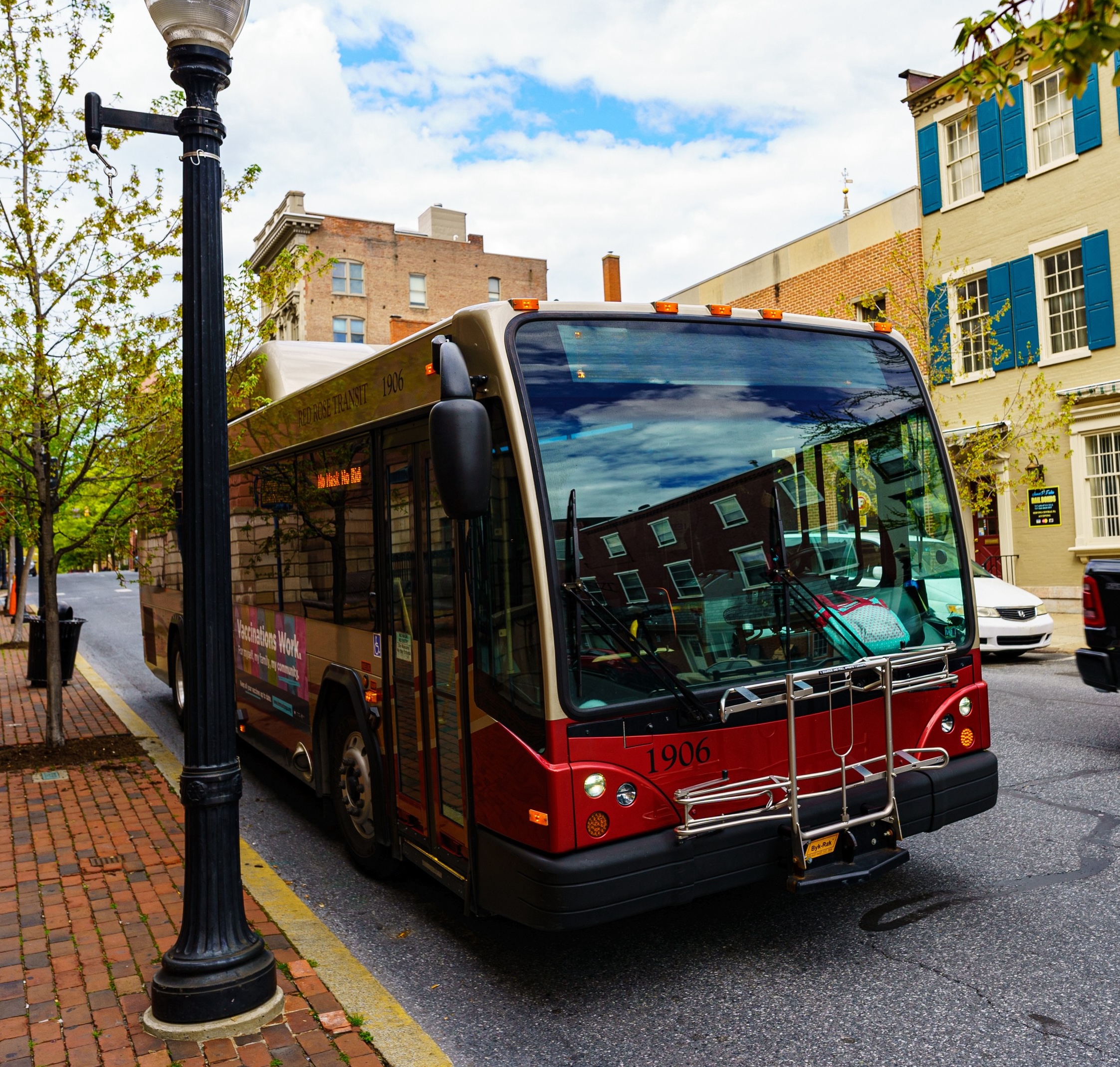 A red bus from the Red Rose Transit Authority on a street in the Lehigh Valley